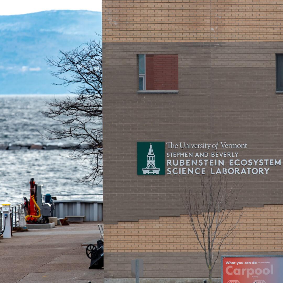 The ecosystem science laboratory building with Lake Champlain in the background.